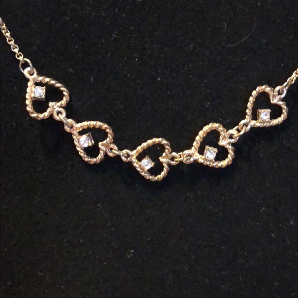 Necklace with gathered hearts
